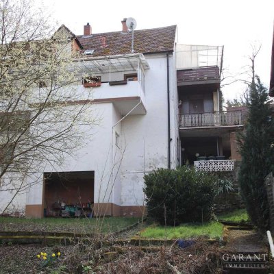 Zweifamilienhaus mit Entwicklungspotenzial und Gartenfläche zur kreativen Neugestaltung