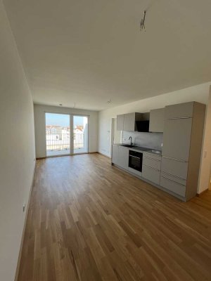 Wohnen mit Weitblick: Neubauwohnung mit Südwest-Balkon im 6. OG