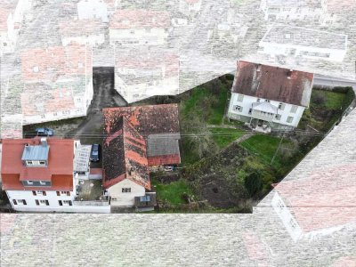 Attraktives Baugrundstück mit Potential: Abrissfähige Gebäude, TG + 3 Stockwerke nach §34 BauGB mögl