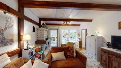 Ein großzügiges Einfamilienhaus mit zusätzlicher Einliegerwohnung im Anbau und einem herrlichen Gart