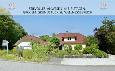 Stilvolles Architektenhaus mit Einliegerwohnung, Wellnessbereich, Fernblick & großem Grundstück!