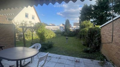 Doppelhaushälfte mit großem Platzangebot, schönem Garten & attraktiver Rendite in Raunheim