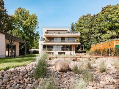 Wohnen in absoluter erster Reihe am Großen Wannsee: Designerapartments auf einem privaten Parkareal.