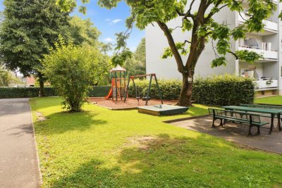 Zentrale Stadtlage,sanierte 3ZI+Balkon,Carport, Allg.Garten, Spielplatz