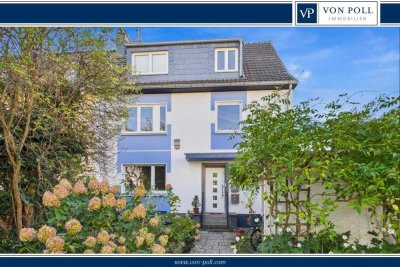 Modernisierte DHH mit Einliegerwohnung, PV, Solar, Garten & Dachterrasse + Garage in Toplage