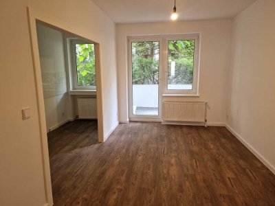 Sanierte EG-Whg. mit Balkon und offener Küche