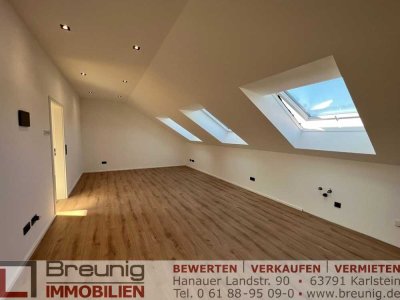 Hochwertige 2-Zi.-Dachgeschosswohnung mit Seeblick in ruhiger Lage