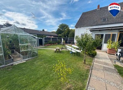 Mehrfamilienhaus mit Baugrundstück in Enger – Platz für Ihre Träume!