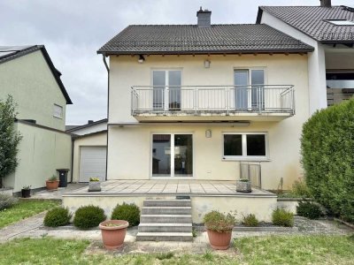 Familienfreundliches Zuhause mit Garten, Doppelgarage und Hobbyraum