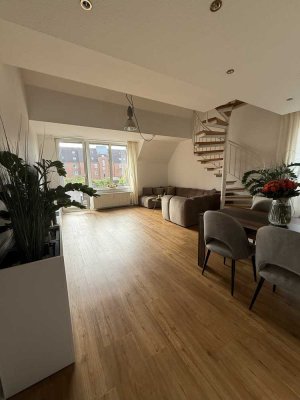 Carmante 2,5-Galeriewohnung mit Balkon in Düsseldorf Lörick