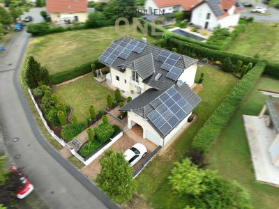Hochwertiges Einfamilienhaus mit Doppelgarage, idyllischem Garten und Photovoltaik