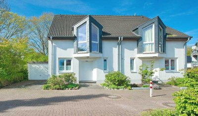 MODERNE DOPPELHAUSHÄLFTE: GRÜN  und  STADTNAH GELEGEN