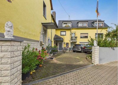 "2 Häuser, 4 Wohnungen, 1 Gelegenheit – Mehrgenerationen & Renditeobjekt in Kesselheim"