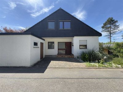 Gute Lage, praktisches Haus - mit Einliegerwohnung und Garten!