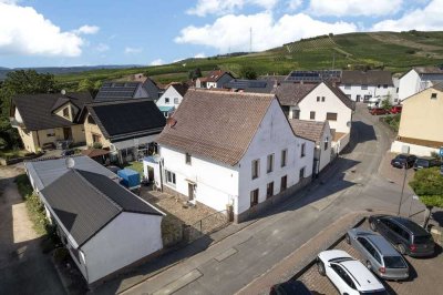 Charmantes Einfamilienhaus mit vielseitigem Nebengebäude in Aspisheim