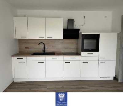 Rollstuhlgerechte Wohnung mit Fußbodenheizung, edlem Bad, moderner EBK, Terrasse!