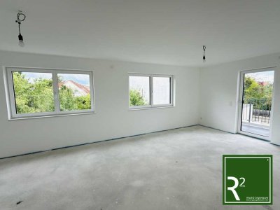 Neubau 3 Zimmer Wohnung im 1.OG mit Balkon in energieeffizientem 5 Familienhaus