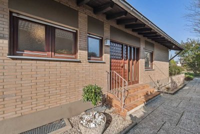 Engel & Völkers: Bungalow in begehrter Wohnlage von Rheidt