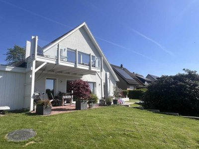 Moderne Erdgeschosswohnung mit traumhaftem Weitblick und Garten in Bielefeld-Theesen