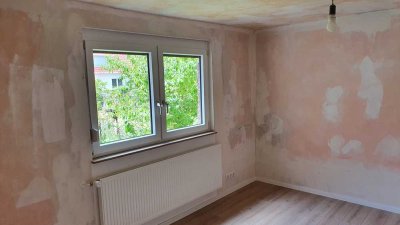 Viel Platz in ruhiger Lage mit Garten –  moderne 3-Zimmer Wohnung im Zweifamilienhaus!