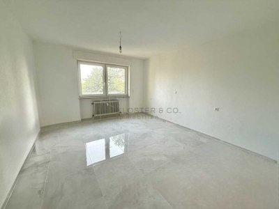 Sanierte 3,5-Zimmer-Wohnung mit Aufzug, Balkon & Einzelgarage