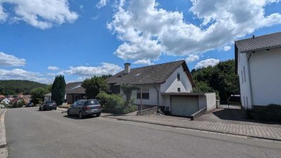 Großzügiges Einfamilienhaus mit Einliegerwohnung & Werkstatt -        Ihr neues Zuhause wartet!
