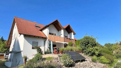 Attraktive 4 Zimmer Eigentumswohnung über zwei Etagen mit Süd-West-Balkon und großem Gartenanteil