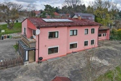 Großzügiges 3-Familienhaus mit Wintergarten, Balkon, Solaranlage & großem Grundstück