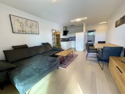 Neuwertige, südseitig ausgerichtete 2-Zimmer-Wohnung mit offen gestaltetem Koch-/Wohn-/Essbereich!