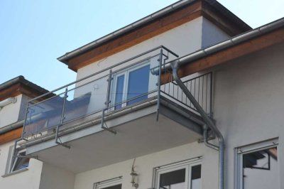 Maisonettewohnung mit Charme: 2 Balkone, Spitzboden  und  Stellplatz in zentraler Lage von Kettig