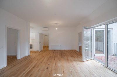 Sanierter Altbau mit modernem Neubau