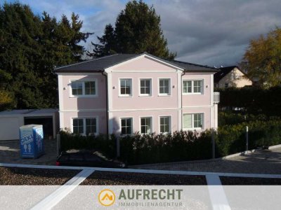 AUFRECHT *EXKLUSIVER NEUBAU* - 4-Zimmer-Obergeschosswohnung mit sonnigem Balkon und Hobbyräumen