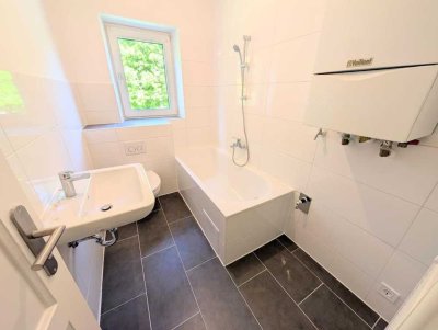 **Wohnung mit eigenem Garten und neuem Tageslichtbad gewünscht? Dann schnell sein!**