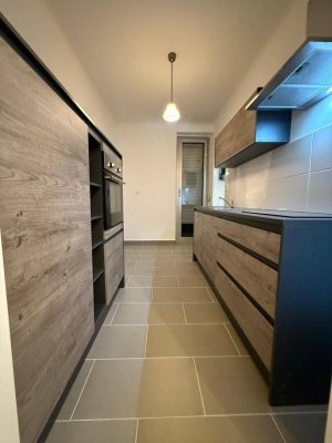 Altbauflair &amp; Wohnkomfort - 2 Zimmer-Wohnung mit Loggia im Herzen Eisenstadts