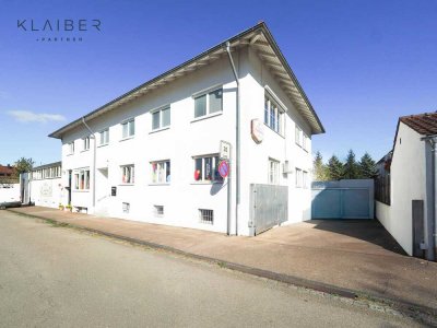 Schönes Wohn-und Geschäftshaus mit 4 Wohn - Geschäftseinheiten ca.1000 qm Flächen, Garagen im Hof.