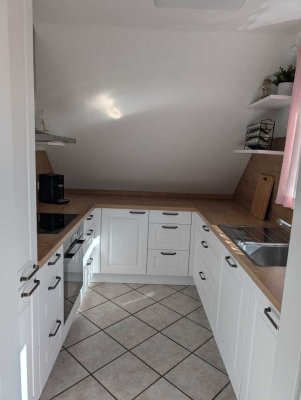 Charmante 3-Zimmer-Dachgeschosswohnung mit Einbauküche und Balkon