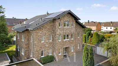 Exklusive Eigentumswohnung auf zwei Ebenen mit Wellnessbad & zwei Garagen