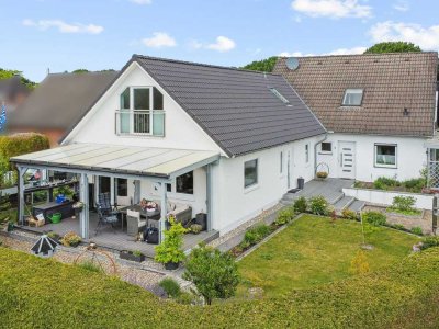 Festpreis! Haus mit zwei separaten Wohneinheiten in familienfreundlicher Lage von Kaltenkirchen