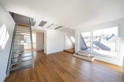 Teilmöblierte Maisonette-Loft-Wohnung mit Einbauküche, Dachterrasse & Stellplatz