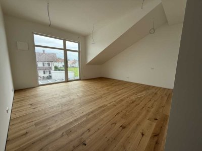Erstbezug: Attraktive 3-Zimmer Dachgeschosswohnung in Legau mit Balkon KfW40-Standard QNG