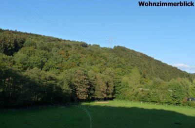 Wohnen, dort wo andere Urlaub machen.  Erdgeschosswohnung mit eigenem Garten und einer  Doppelgarage