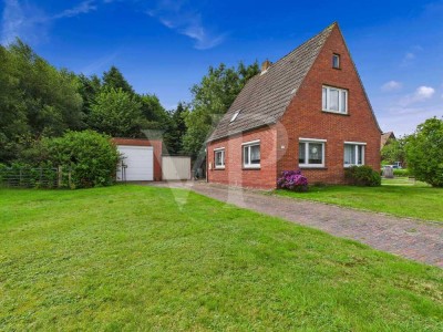 Familienleben gestalten: Großzügiges Haus mit individuellem Entwicklungspotenzial in Großheide