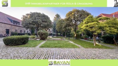 SAYAN Immobilien - Rondorf: Wohnen in einer denkmalgeschützen Hofanlage mit riesigem Garten -