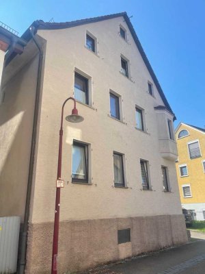 Haushälfte mit Gewerbeeinheit in Aalen-Unterkochen – Investitionsobjekt mit Entwicklungspotenzial