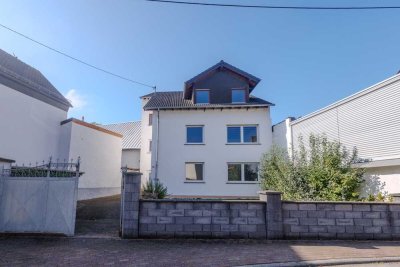 Großzügiges Haus mit ansprechendem Grundstück in zentraler Lage