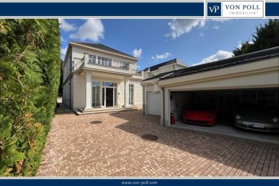 VON POLL - BAD HOMBURG: Energieeffiziente Villa mit Pool und 3 Garagen in einzigartiger Blicklage