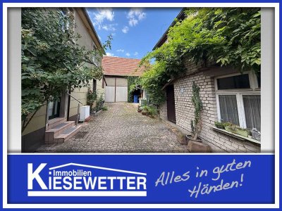 Einfamilienhaus mit Nebengebäude, Scheune und Garage – ehemaliger Winzerbetrieb in Mettenheim