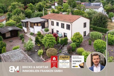Familienfreundliches Einfamilienhaus mit Wintergarten, Kaminofen und gepflegtem Garten