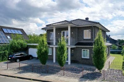 Modernes Einfamilienhaus mit zwei Vollgeschossen und Garage in Scheeßel