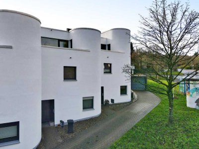 Moderne Perspektive: Reihenmittelhaus mit Aussicht, besten Energiewerten & Mieteinnahmen